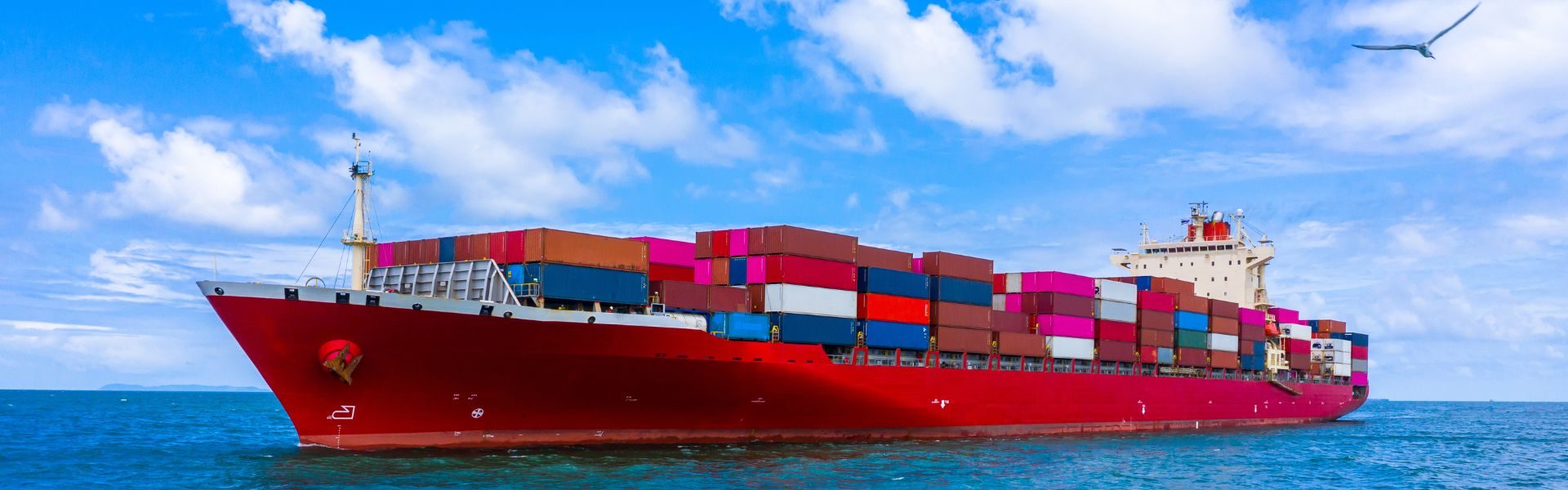 Container ship sailing in open sea